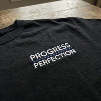 Progress Over Perfection Embroidered Heavyweight Tee – Comfort Colors - Black Heavyweight Embroidered Tee - Sobervation